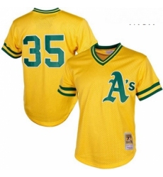 Mens Mitchell and Ness Oakland Athletics 35 Rickey Henderson Authentic Gold 1984 Throwback MLB Jersey