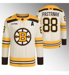 Men Boston Bruins 88 David Pastrnak Cream With Rapid7 Patch 100th Anniversary Stitched Jersey